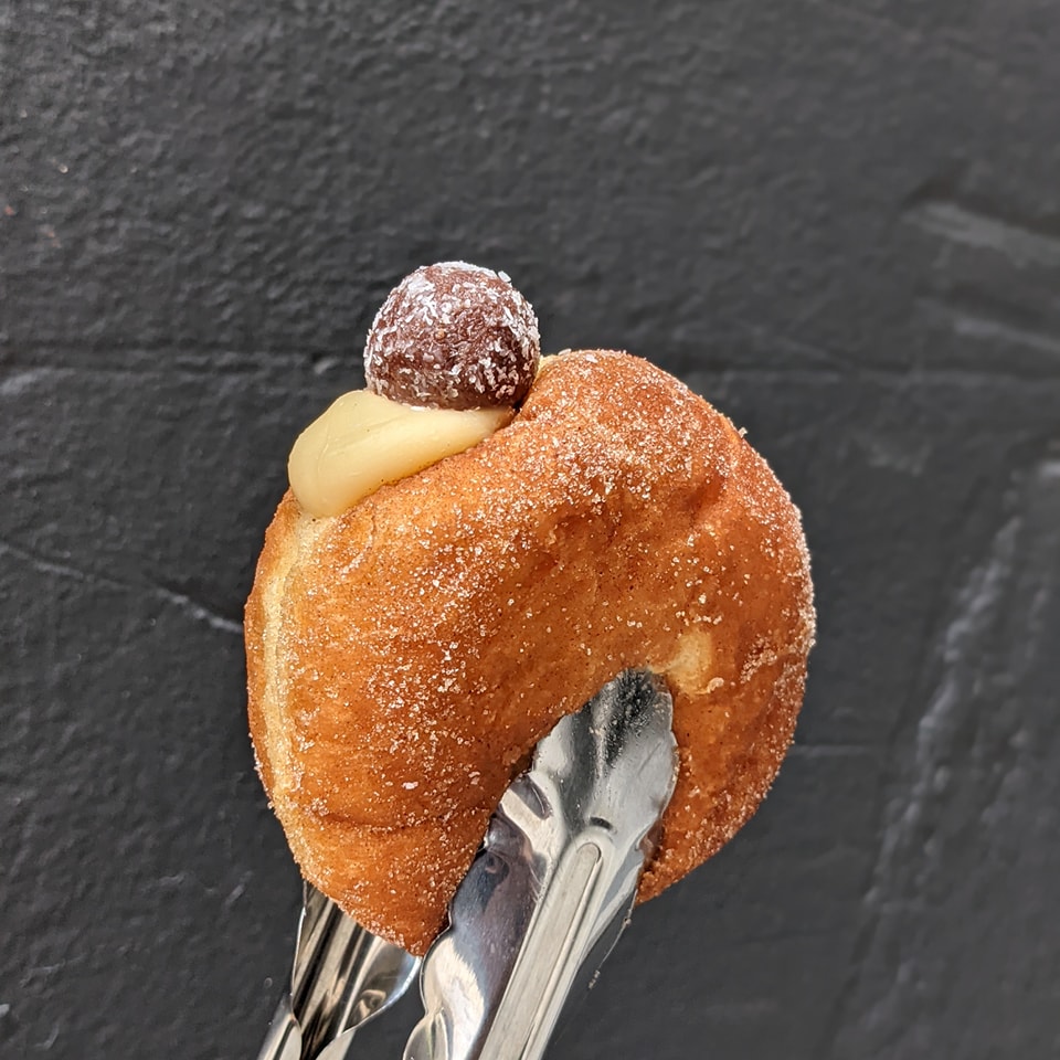 Custard doughnut with sugar